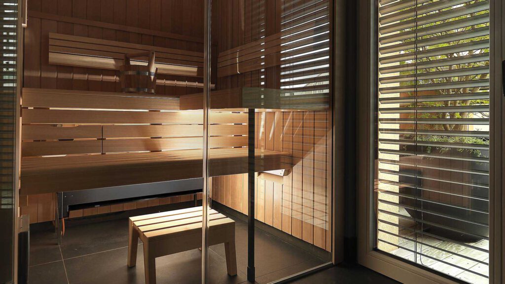 Private sauna at Nº3 Schinkelplatz in Berlin-Mitte with wooden interior and integrated lighting