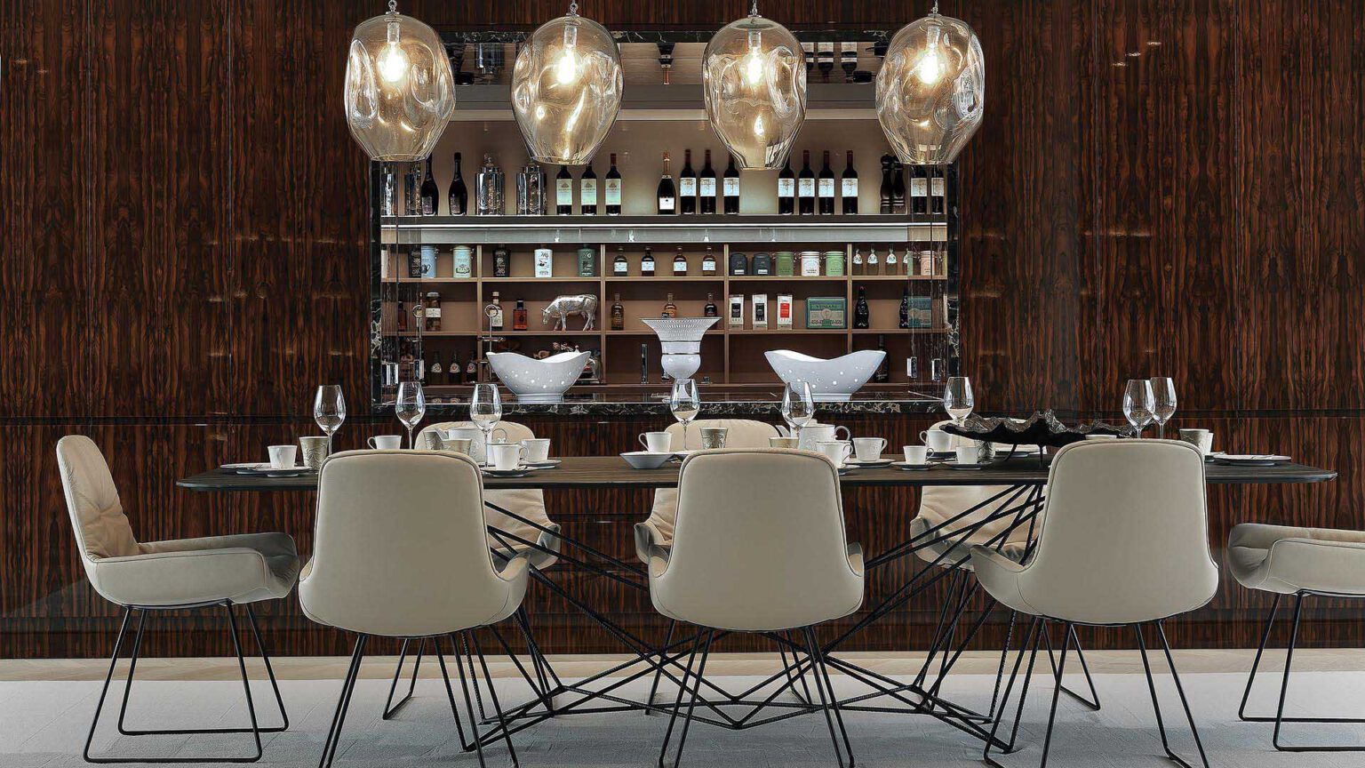 Dining area at Nº3 Schinkelplatz in Berlin-Mitte with designer lights and integrated bar wall