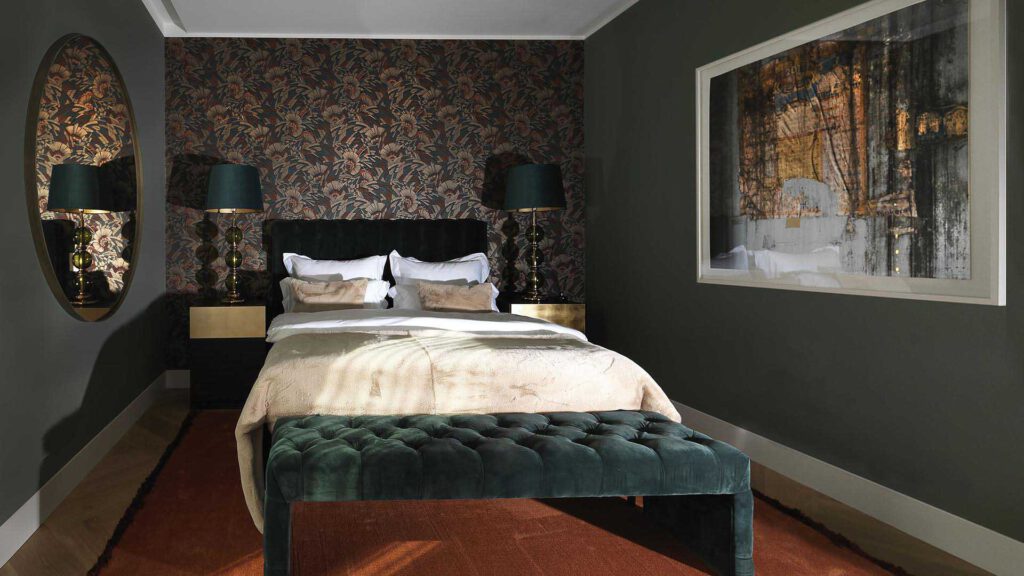 Bedroom at Nº3 Schinkelplatz in Berlin-Mitte with upholstered bed, wallpaper and elegant mood lighting