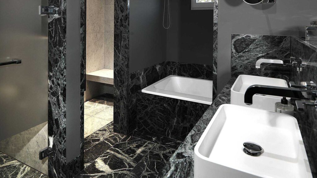 Bathroom at Nº3 Schinkelplatz in Berlin-Mitte with walk-in shower and natural stone surfaces